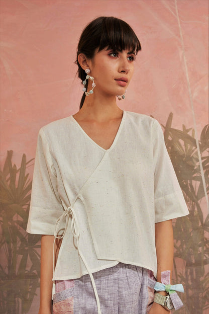 Off-White Short Tie-Up Top at Kamakhyaa by Charkhee. This item is Casual Wear, Cotton, Less than $50, Natural, Regular Fit, Textured, Tops, White, Womenswear, Wrap Tops