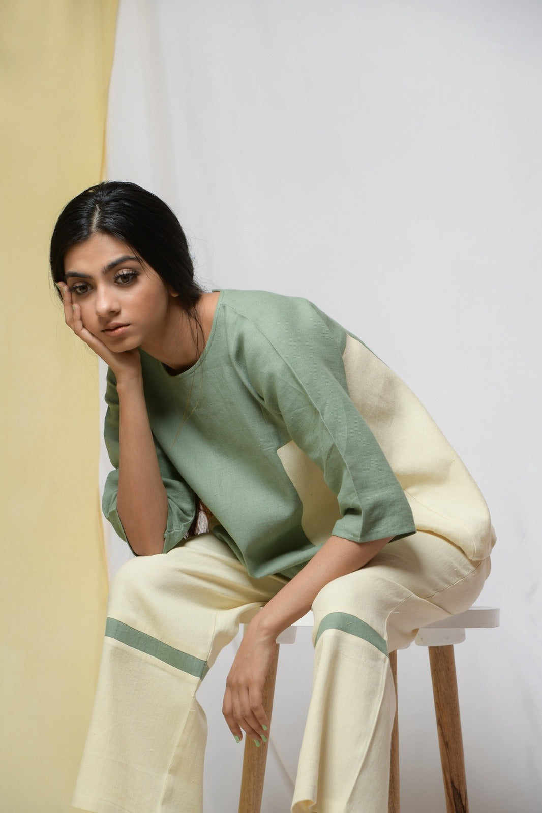 Off-white Bliss Of Life Trousers at Kamakhyaa by Niraa. This item is Cotton khadi, Natural with azo dyes, Off-white, Office Wear, Regular Fit, Solids, Tales of rippling brooks, Trousers, Womenswear