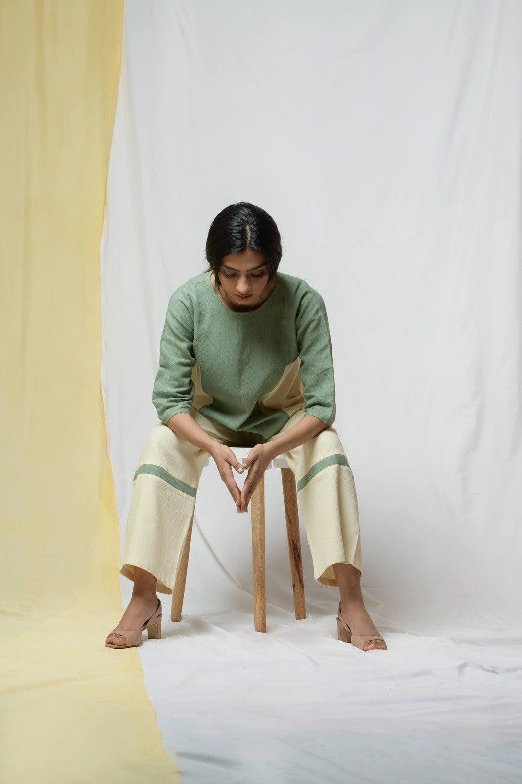 Off-white Bliss Of Life Trousers at Kamakhyaa by Niraa. This item is Cotton khadi, Natural with azo dyes, Off-white, Office Wear, Regular Fit, Solids, Tales of rippling brooks, Trousers, Womenswear