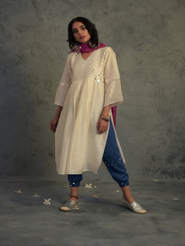 Off-white Chanderi Kurta Set With Jogger at Kamakhyaa by Charkhee. This item is Chanderi, Cotton, Embellished, Ethnic Wear, Indian Wear, Kurta Pant Sets, Kurta Set With Dupatta, Mirror Work, Natural, Pink, Relaxed Fit, Tyohaar, White, Womenswear