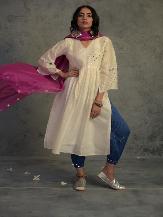 Off-white Chanderi Kurta Set With Jogger at Kamakhyaa by Charkhee. This item is Chanderi, Cotton, Embellished, Ethnic Wear, Indian Wear, Kurta Pant Sets, Kurta Set With Dupatta, Mirror Work, Natural, Pink, Relaxed Fit, Tyohaar, White, Womenswear
