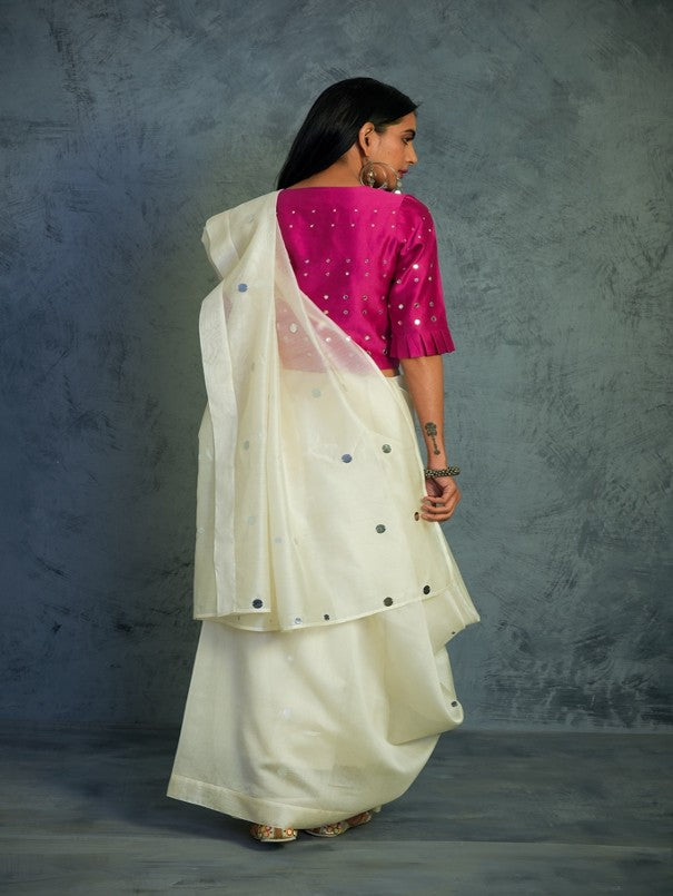 Off-white Chanderi Saree With Blouse at Kamakhyaa by Charkhee. This item is Chanderi, Cotton, Embellished, Ethnic Wear, For Mother, Indian Wear, Mirror Work, Natural, Pink, Relaxed Fit, Saree Sets, Tyohaar, White, Womenswear