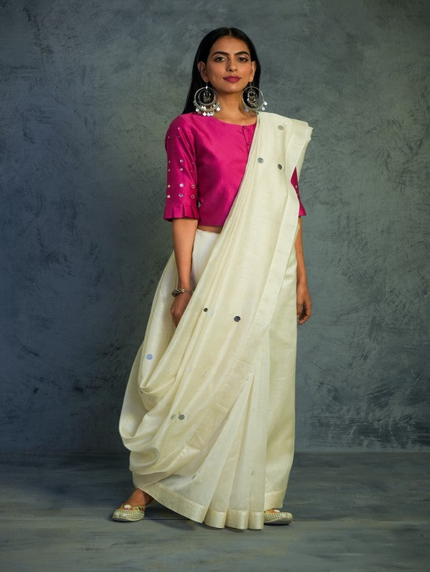 Off-white Chanderi Saree With Blouse at Kamakhyaa by Charkhee. This item is Chanderi, Cotton, Embellished, Ethnic Wear, For Mother, Indian Wear, Mirror Work, Natural, Pink, Relaxed Fit, Saree Sets, Tyohaar, White, Womenswear