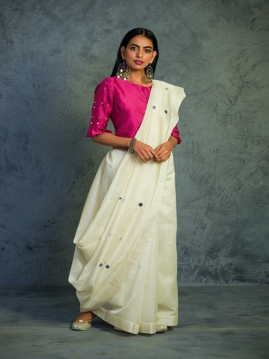 Off-white Chanderi Saree With Blouse at Kamakhyaa by Charkhee. This item is Chanderi, Cotton, Embellished, Ethnic Wear, For Mother, Indian Wear, Mirror Work, Natural, Pink, Relaxed Fit, Saree Sets, Tyohaar, White, Womenswear