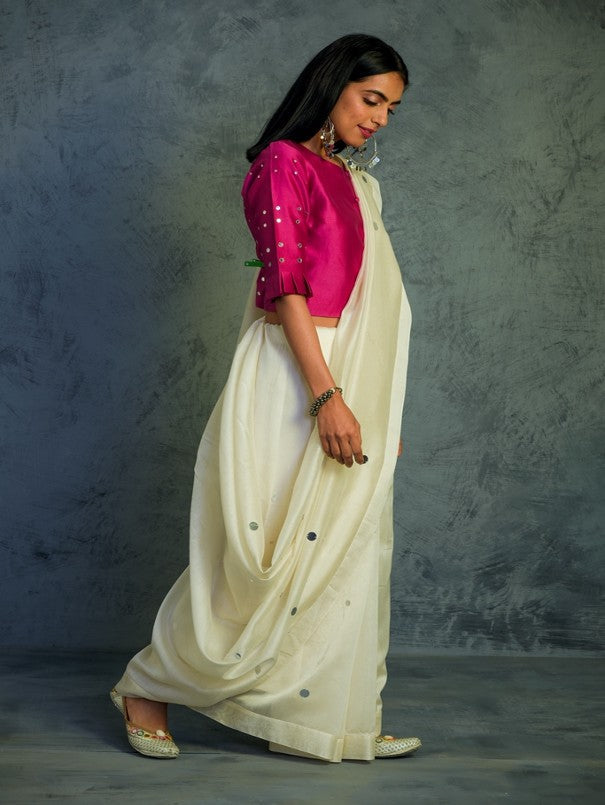 Off-white Chanderi Saree With Blouse at Kamakhyaa by Charkhee. This item is Chanderi, Cotton, Embellished, Ethnic Wear, For Mother, Indian Wear, Mirror Work, Natural, Pink, Relaxed Fit, Saree Sets, Tyohaar, White, Womenswear