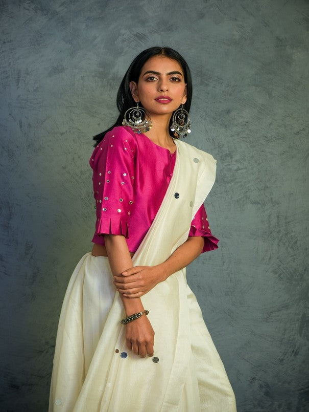 Off-white Chanderi Saree With Blouse at Kamakhyaa by Charkhee. This item is Chanderi, Cotton, Embellished, Ethnic Wear, For Mother, Indian Wear, Mirror Work, Natural, Pink, Relaxed Fit, Saree Sets, Tyohaar, White, Womenswear