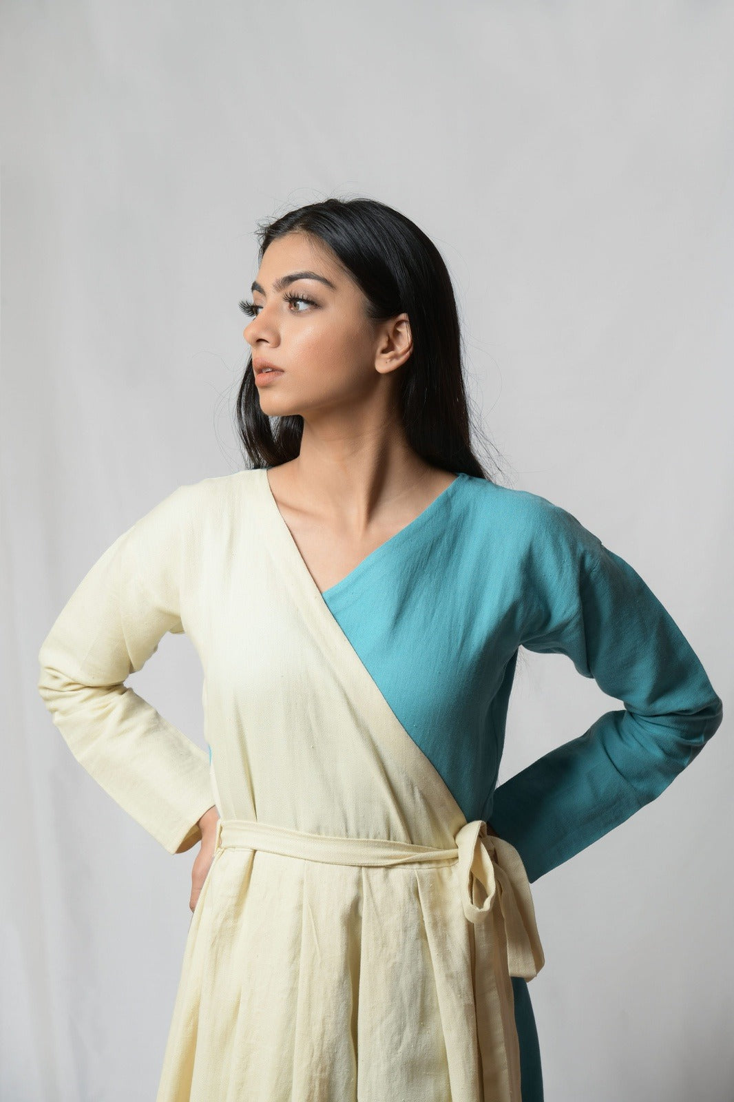 Off-white Dare To Dream Wrap Dress at Kamakhyaa by Niraa. This item is Cotton khadi, Evening Wear, Natural with azo dyes, Off-white, Relaxed Fit, Solids, Tales of rippling brooks, Womenswear, Wrap Dresses