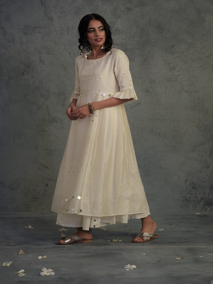 Off-white Pleated Kurta Set Of 3 at Kamakhyaa by Charkhee. This item is Chanderi, Cotton, Embellished, Ethnic Wear, Indian Wear, Kurta Palazzo Sets, Kurta Set With Dupatta, Mirror Work, Natural, Relaxed Fit, Tyohaar, White, Womenswear