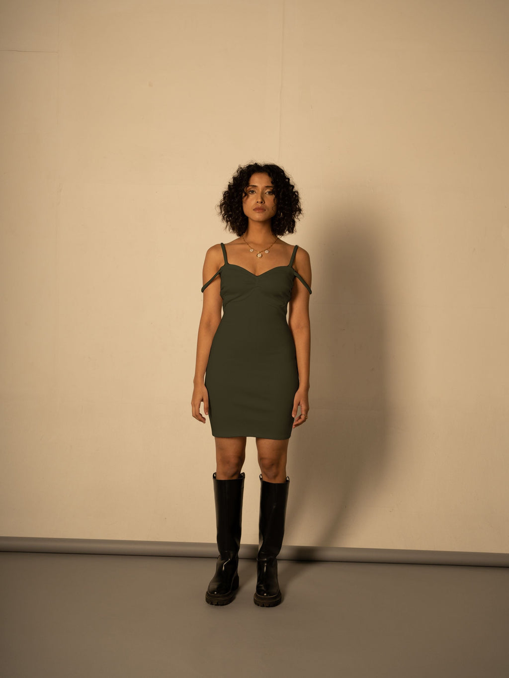Olive Dress Cotton Mini Dress at Kamakhyaa by Meko Studio. This item is Cotton, Evening Wear, July Sale, July Sale 2023, Mini Dresses, Olive Green, Sleeveless Dresses, Slim Fit, Solids, Strap Dresses, Tranquil AW-22/23, Womenswear