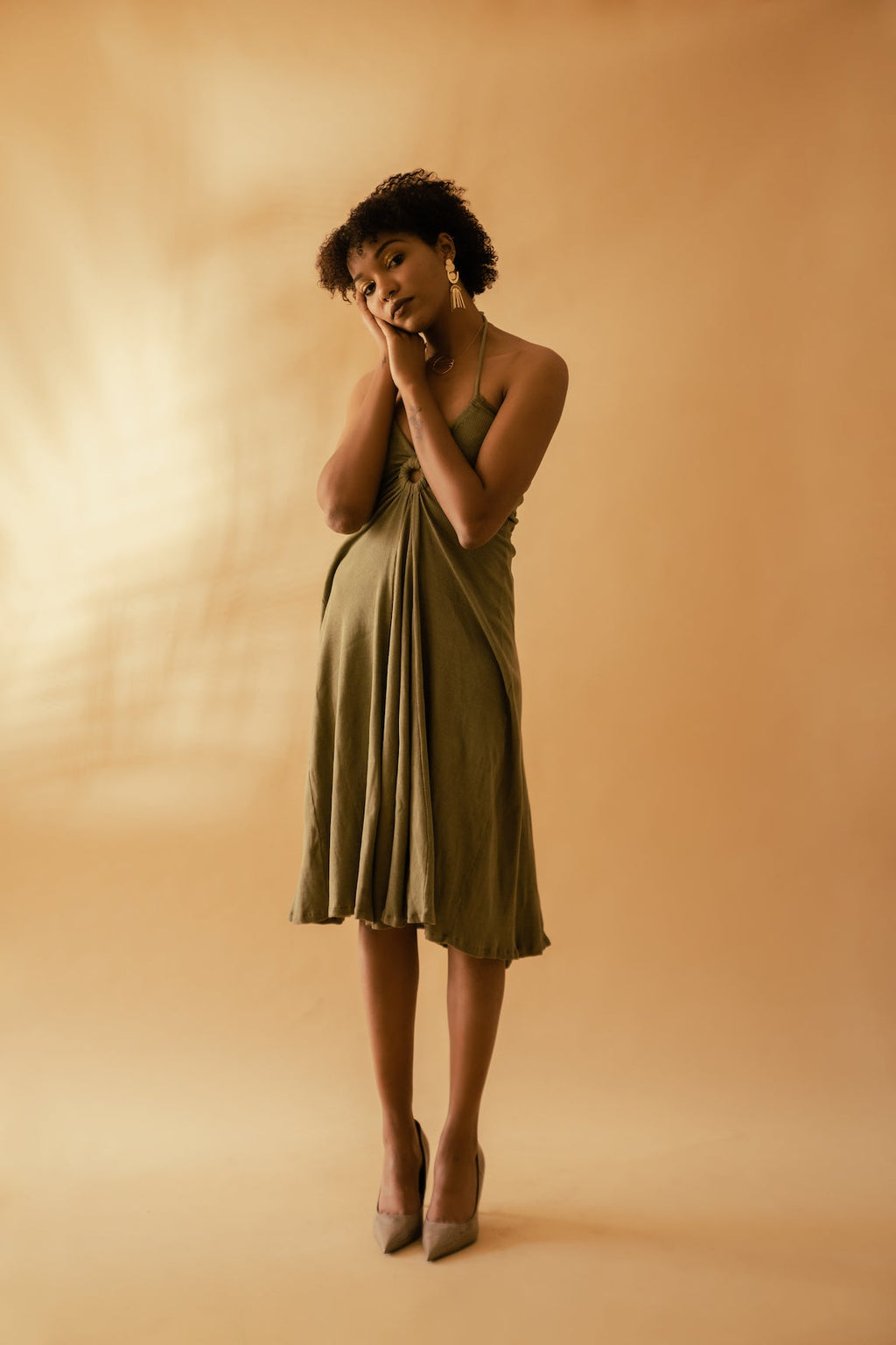 Olive Green Cotton Midi Dress at Kamakhyaa by Meko Studio. This item is Cotton, Deadstock Fabrics, Evening Wear, July Sale, July Sale 2023, Lycra, Midi Dresses, Regular Fit, Sleeveless Dresses, Solids, Strap Dresses, Verao SS-22/23, Womenswear