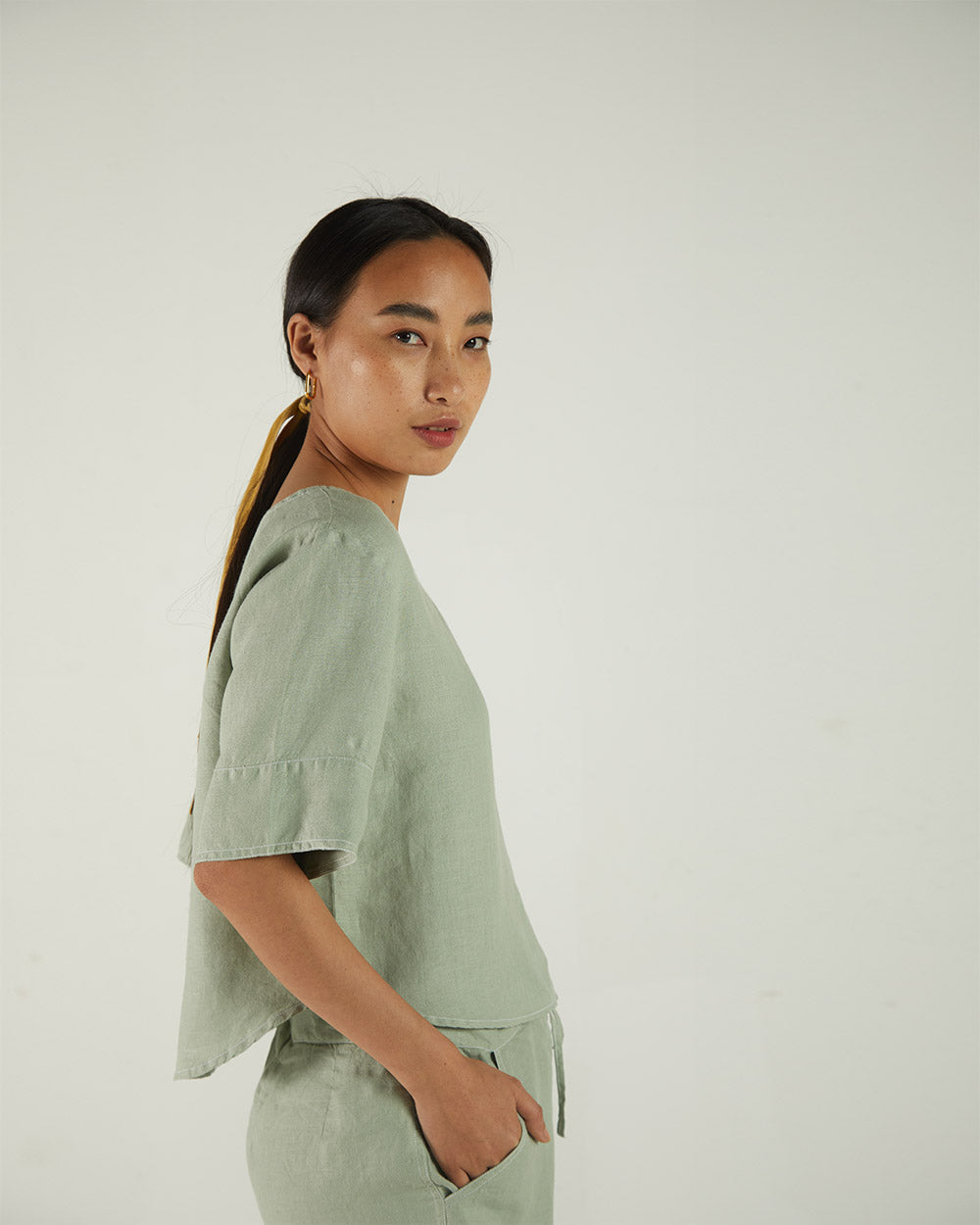 Olive Green Crop Top at Kamakhyaa by Reistor. This item is Bemberg, Casual Wear, Crop Tops, Green, Hemp, Natural, Regular Fit, Solids, Tops, Womenswear