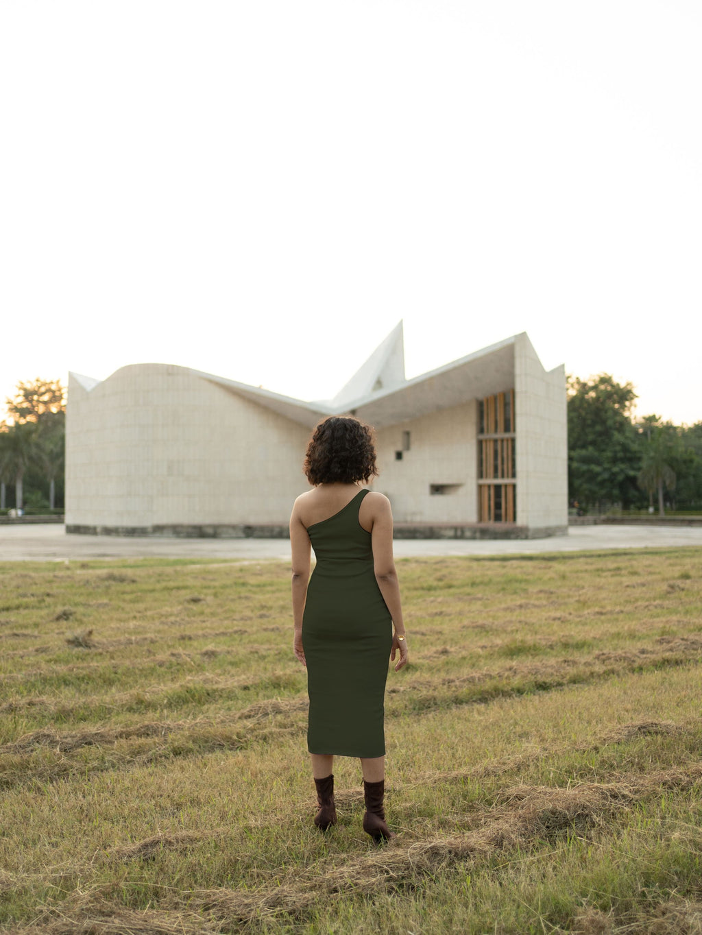 Olive Green Midi Dress at Kamakhyaa by Meko Studio. This item is Cotton, Evening Wear, July Sale, July Sale 2023, Midi Dresses, Olive Green, One Shoulder Dresses, Slim Fit, Solids, Tranquil AW-22/23, Womenswear