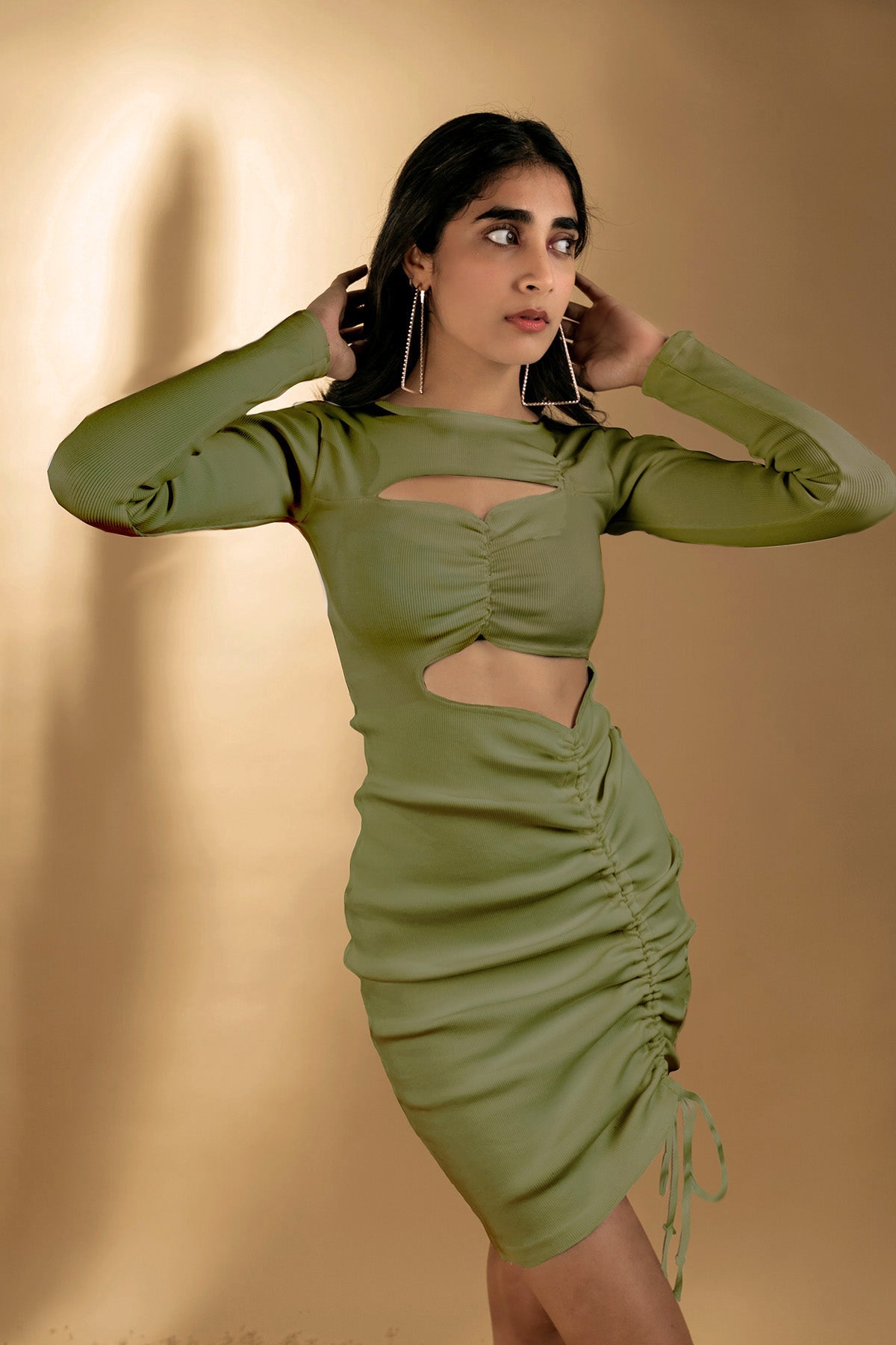 Olive Green Mini Dress at Kamakhyaa by Meko Studio. This item is Cut Out Dresses, Deadstock Fabrics, Evening Wear, July Sale, July Sale 2023, Mini Dresses, Olive Green, Reroot AW-21/22, Slim Fit, Solids, Womenswear