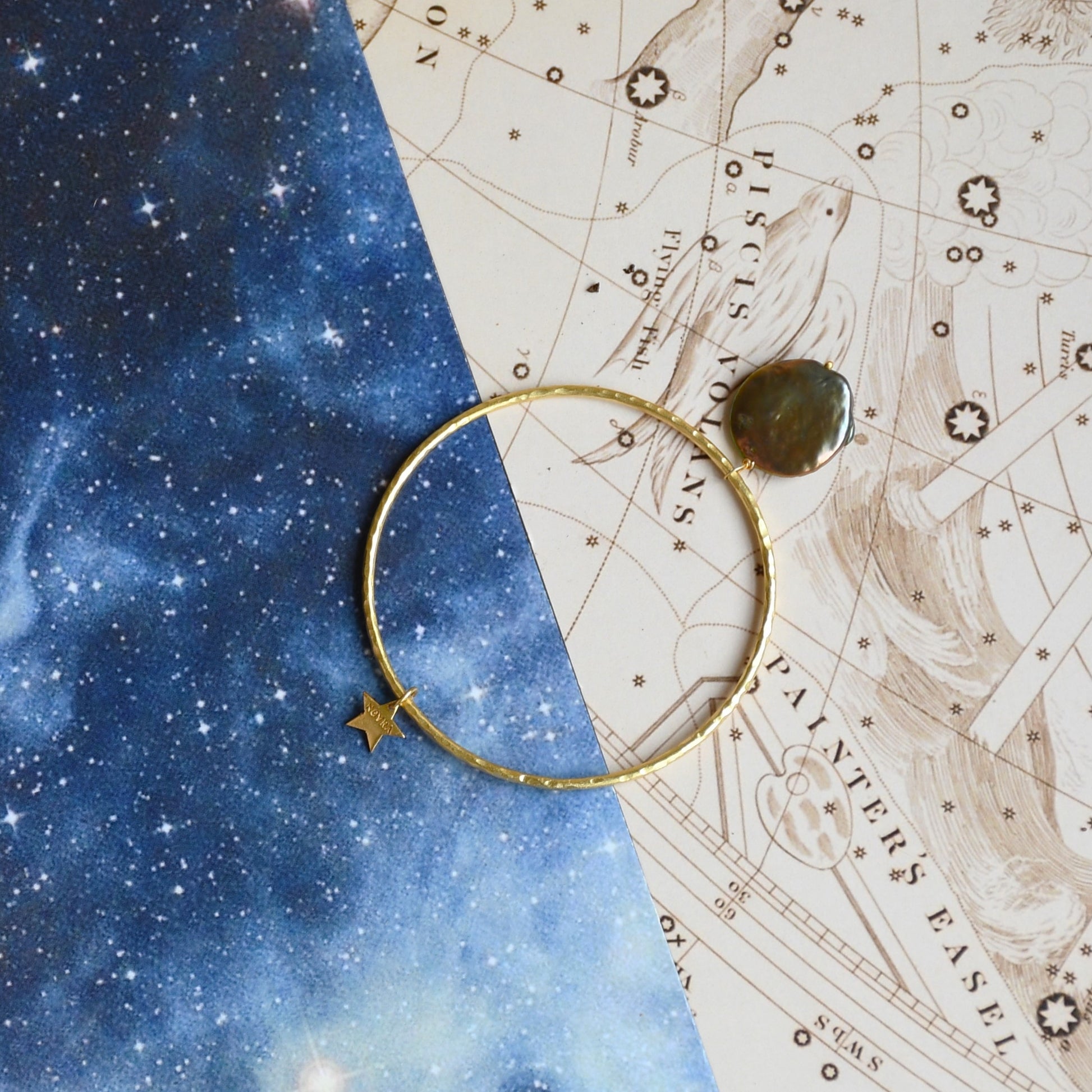 Omega Nebula Bangle at Kamakhyaa by Noyra. This item is Add Ons, Bangles, Fashion Jewellery, Gold, jewelry, July Sale, July Sale 2023, Micron, Natural, Silver, Textured