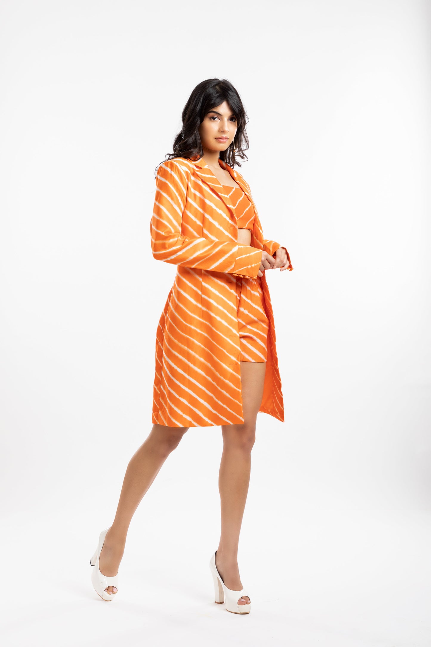 Orange Coat at Kamakhyaa by House Of Ara. This item is Casual Wear, Chanderi, Coats, Cotton, Leheriya, Leheriya Collection, Natural, Orange, Regular Fit, Silk, Stripes, Womenswear