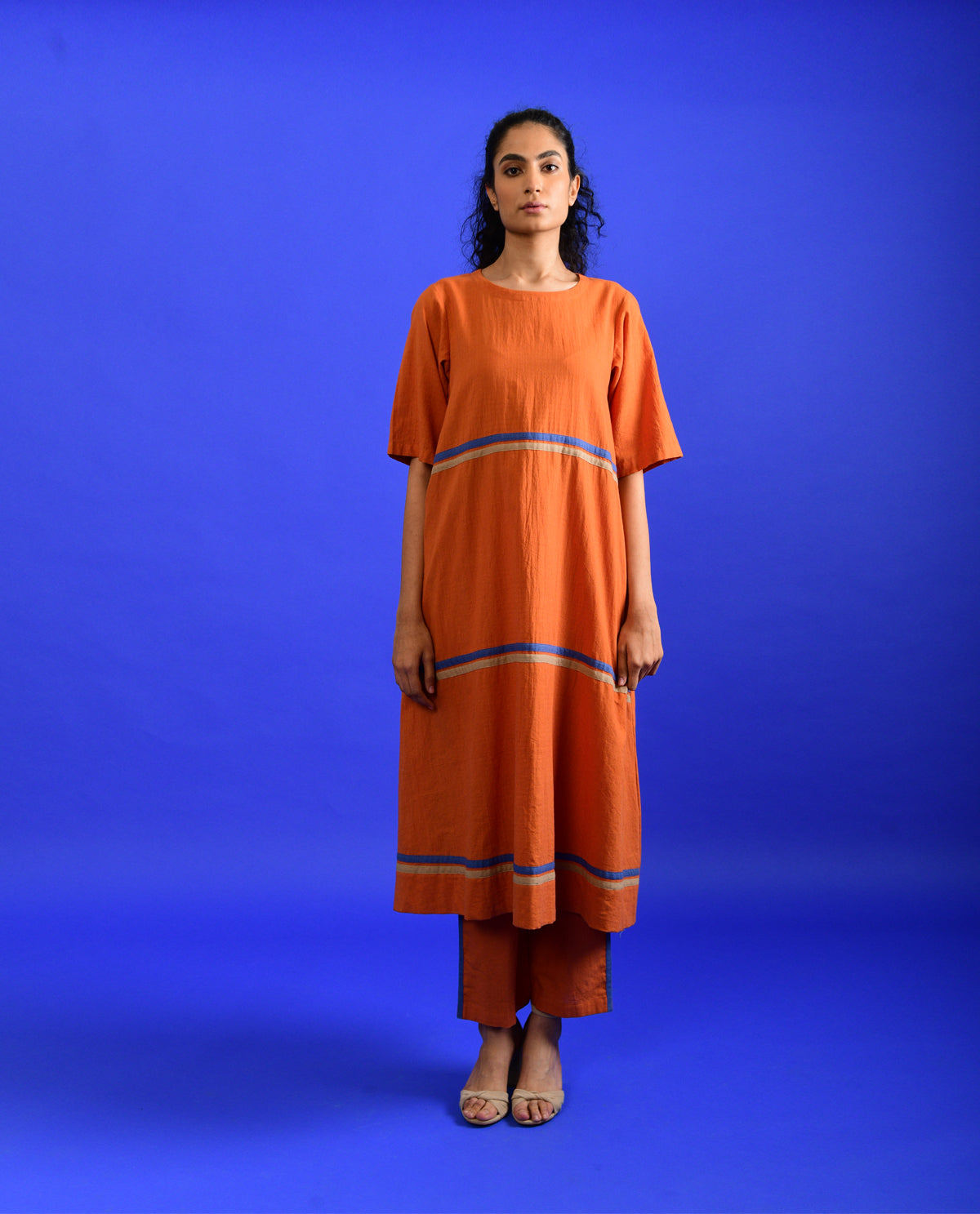 Orange Cotton Co-ord Set at Kamakhyaa by Rias Jaipur. This item is Casual Wear, Co-ord Sets, Handloom Cotton, Handspun, Handwoven, Hue, Orange, Regular Fit, Stripes, Travel, Travel Co-ords, Womenswear