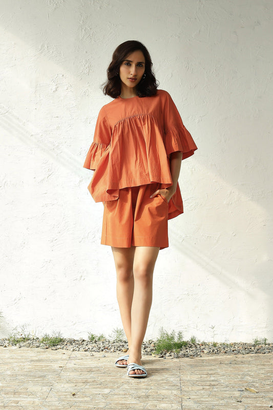 Orange Cotton Poplin Top With Shorts Set at Kamakhyaa by Canoopi. This item is Canoopi, Casual Wear, Complete Sets, Natural, Orange, Poplin, Regular Fit, Solids, Vacation Co-ords, Womenswear
