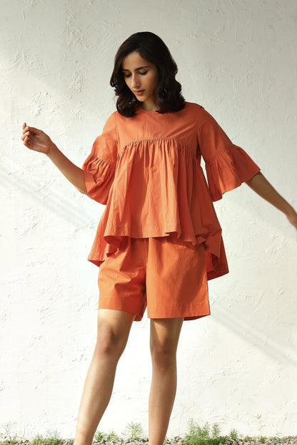 Orange Cotton Poplin Top With Shorts Set at Kamakhyaa by Canoopi. This item is Canoopi, Casual Wear, Complete Sets, Natural, Orange, Poplin, Regular Fit, Solids, Vacation Co-ords, Womenswear