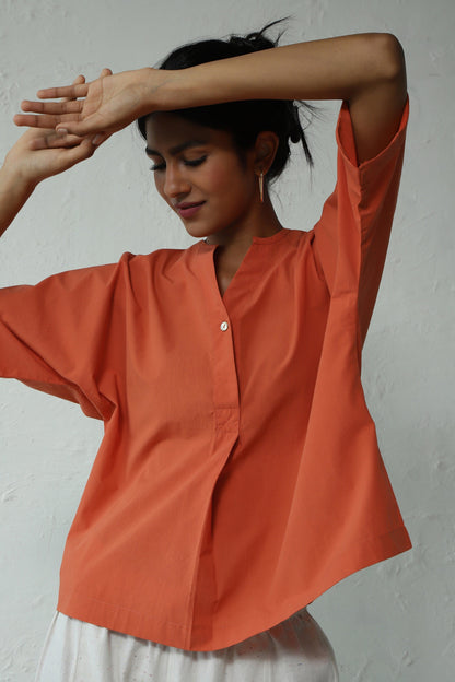 Orange Cotton Shirt With White Khadi Pant Set at Kamakhyaa by Canoopi. This item is Canoopi, Casual Wear, Complete Sets, Khadi, Natural, Orange, Poplin, Regular Fit, Solids, Vacation Co-ords, White, Womenswear
