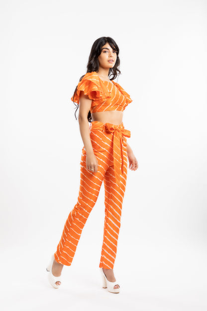 Orange Crop Top with Ruffles at Kamakhyaa by House Of Ara. This item is Casual Wear, Chanderi, Cotton, Crop Tops, Fitted at Bust, Leheriya, Leheriya Collection, Natural, Off-shoulder Tops, Orange, Silk, Stripes, Womenswear