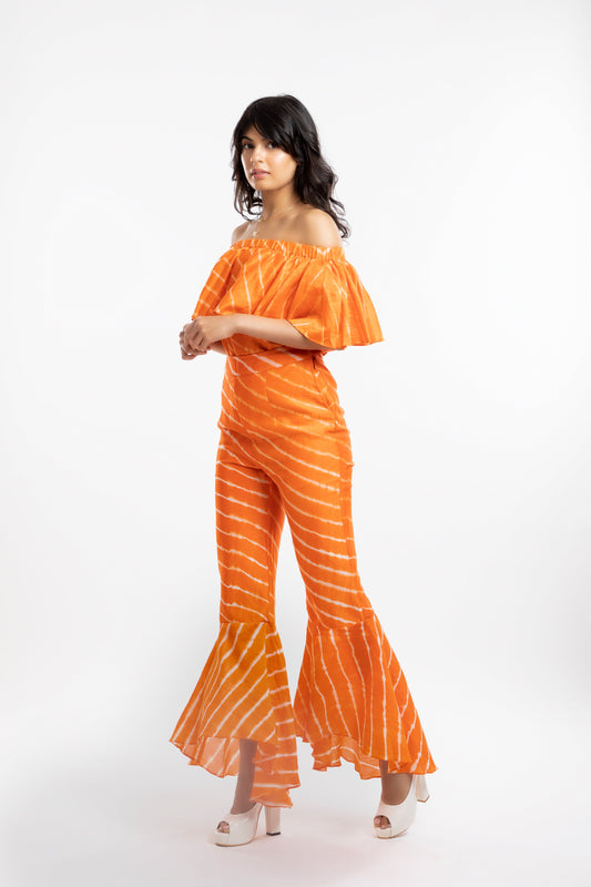Orange High-Low Flare Trousers at Kamakhyaa by House Of Ara. This item is Casual Wear, Chanderi, Fitted at Waist, Leheriya, Leheriya Collection, Natural, Orange, Stripes, Trousers, Womenswear