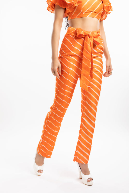 Orange High-Rise Straight Trousers at Kamakhyaa by House Of Ara. This item is Casual Wear, Chanderi, Cotton, Fitted at Waist, Leheriya, Leheriya Collection, Natural, Orange, Silk, Stripes, Trousers, Womenswear