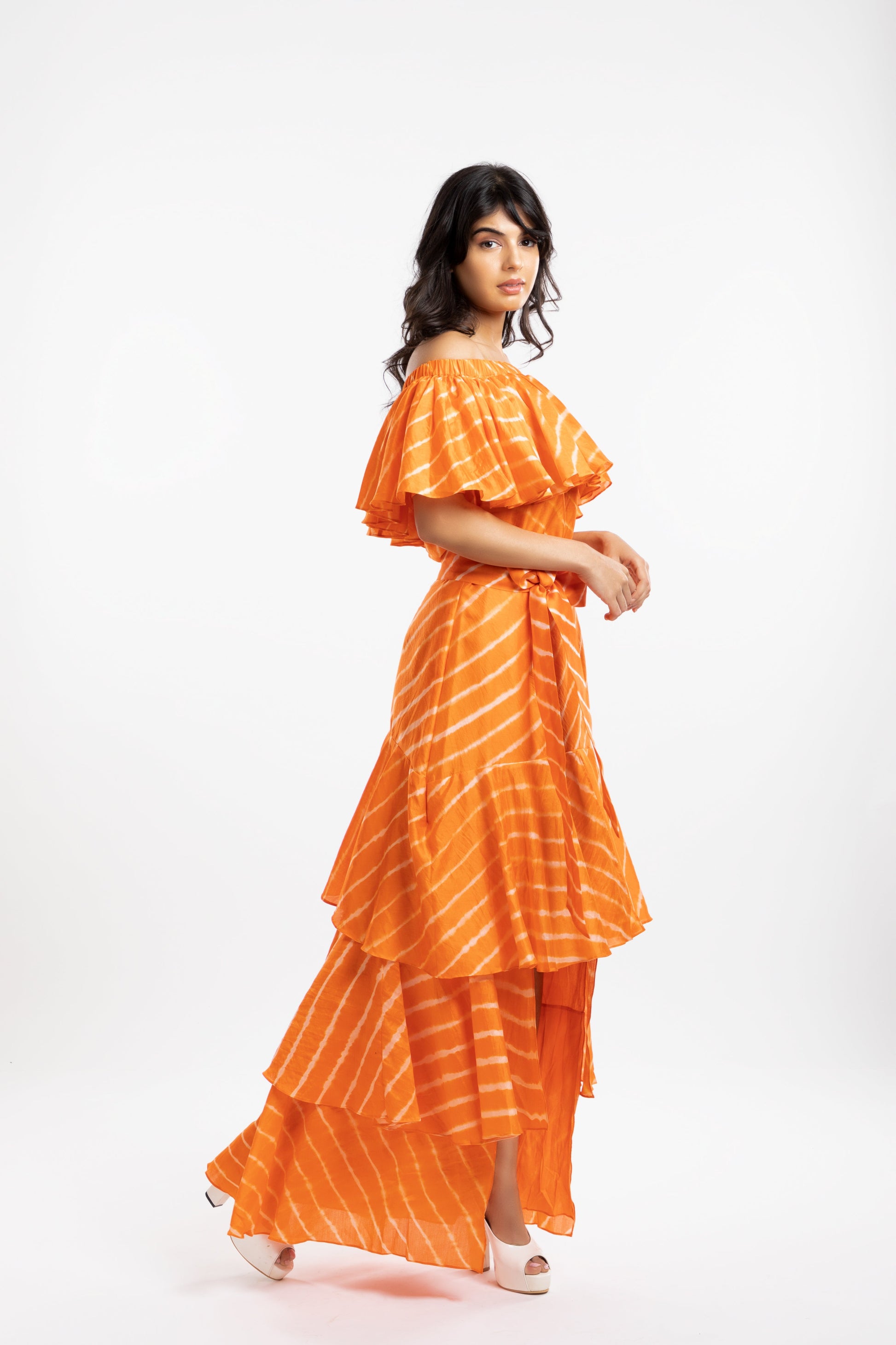 Orange Off-The-Shoulder Top at Kamakhyaa by House Of Ara. This item is Casual Wear, Chanderi, Cotton, Leheriya, Leheriya Collection, Natural, Off-shoulder Tops, Orange, Regular Fit, Shoulder Tops, Stripes, Womenswear