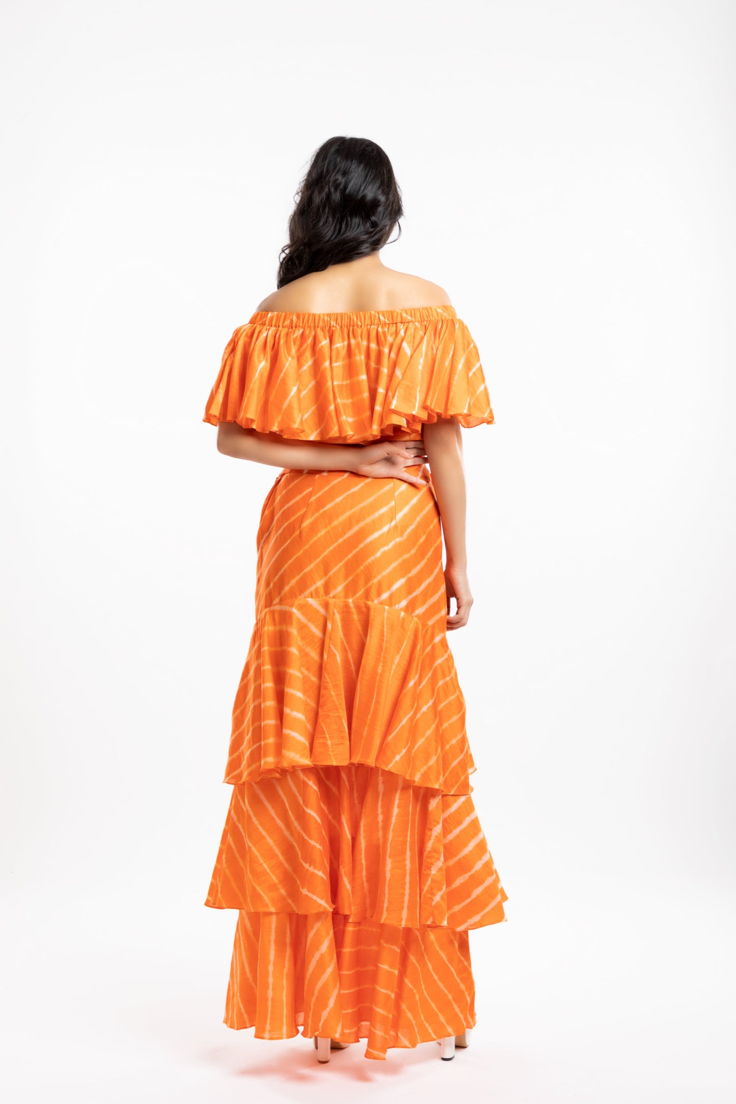 Orange Off-The-Shoulder Top at Kamakhyaa by House Of Ara. This item is Casual Wear, Chanderi, Cotton, Leheriya, Leheriya Collection, Natural, Off-shoulder Tops, Orange, Regular Fit, Shoulder Tops, Stripes, Womenswear