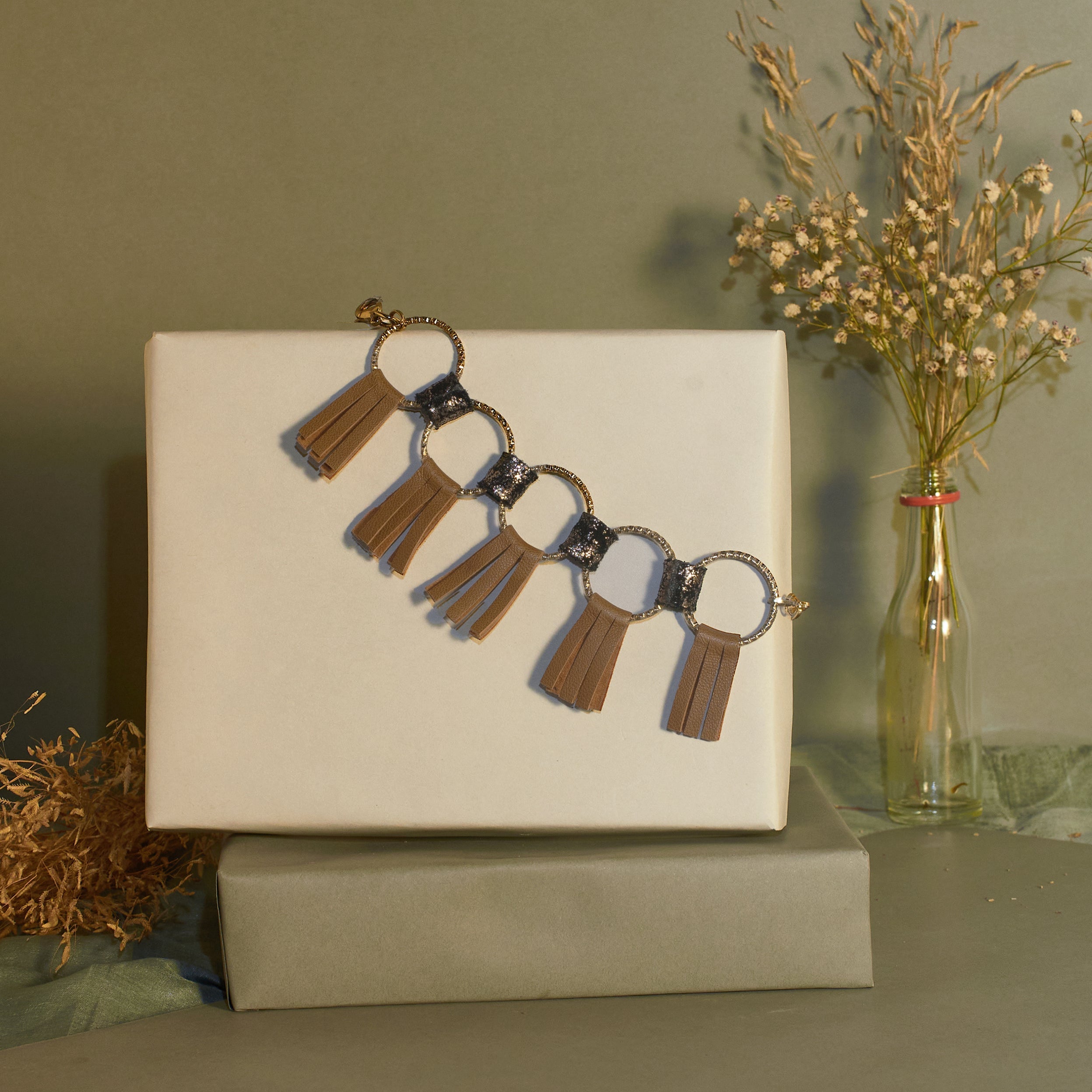 Orb Bracelet at Kamakhyaa by Noupelle. This item is Add Ons, Bracelets, Brown, Casual Wear, Free Size, jewelry, Less than $50, Natural, Textured, Upcycled, Upcycled leather