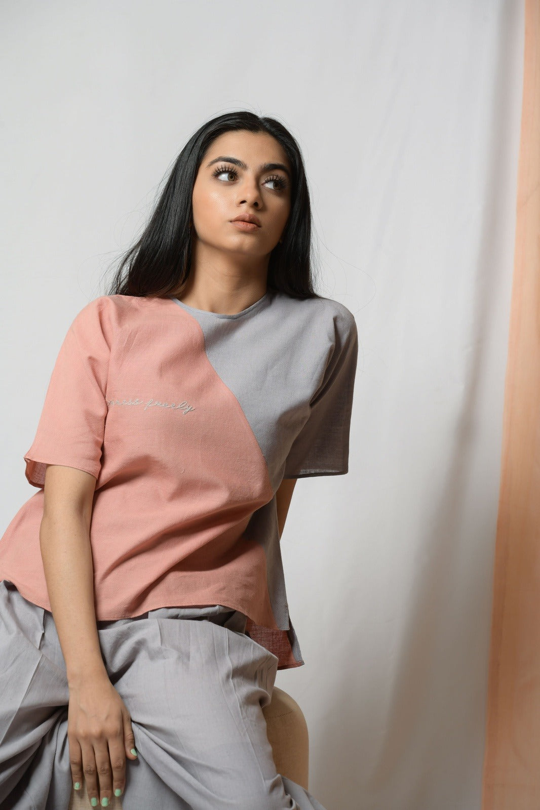 Peach Cotton Khadi Tunic Top at Kamakhyaa by Niraa. This item is Blouses, Casual Wear, Cotton khadi, Fitted At Bust, Multicolor, Natural with azo dyes, Peach, Solids, Tales of rippling brooks, Tops, Womenswear