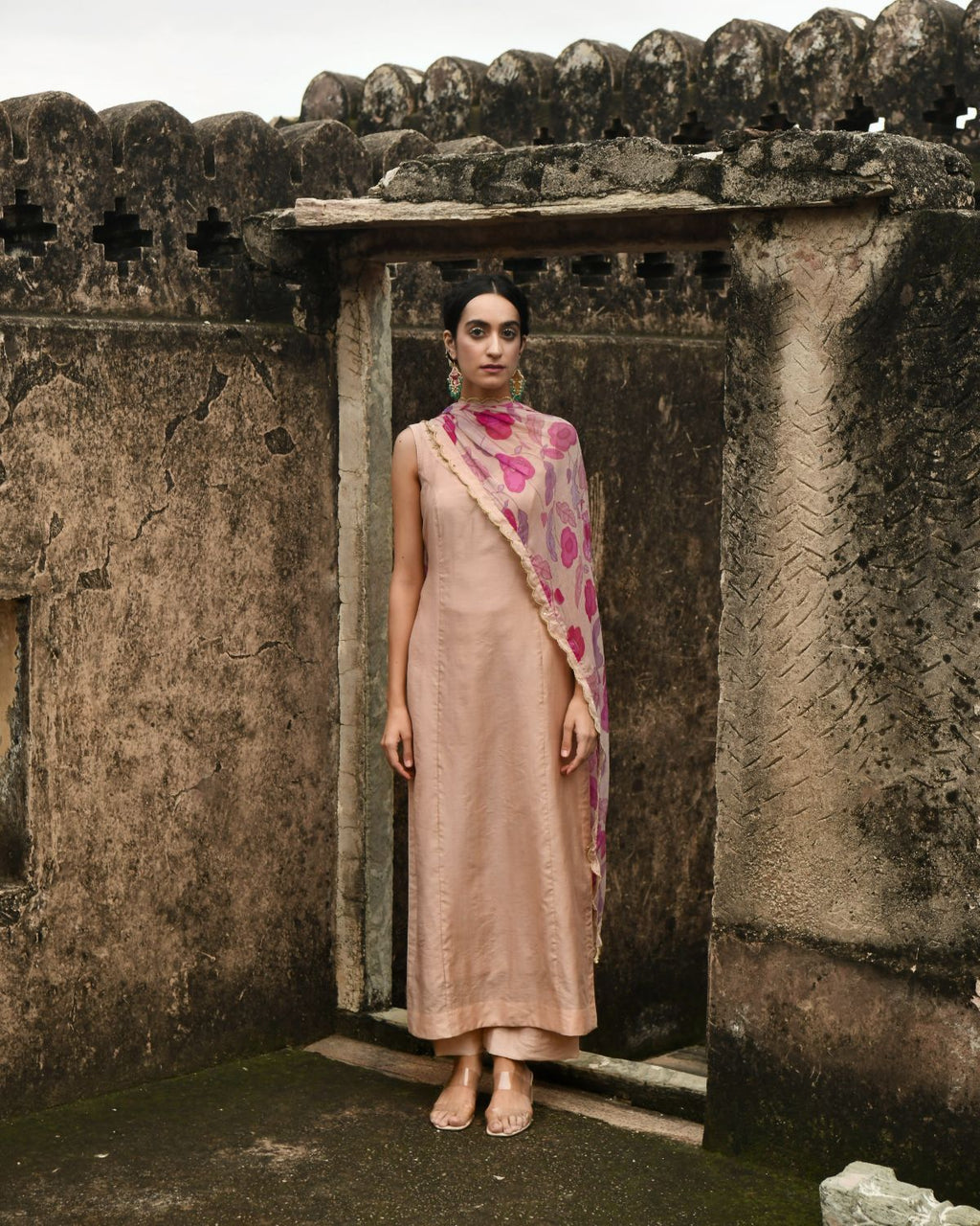 Peach Kurta Set With Dupatta at Kamakhyaa by Taro. This item is Beads work, Best Selling, Chanderi Silk, Chiffon, Digital Print, Enchanted Garden, Evening Wear, Festive Wear, Indian Wear, July Sale, July Sale 2023, Kurta Pant Sets, Kurta Set With Dupatta, Natural, Natural with azo free dyes, Peach, Sequin Work, Womenswear