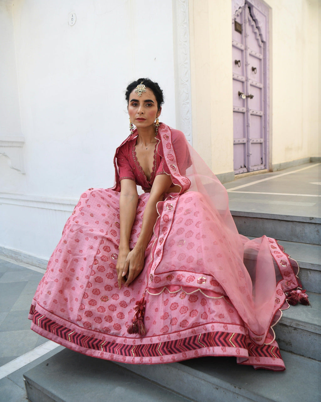Pink Embroidered Printed Silk Lehenga Set at Kamakhyaa by Taro. This item is Evening Wear, Handwoven cotton silk, Indian Wear, July Sale, July Sale 2023, Lehenga Sets, Natural, Pink, Prints, Regular Fit, Sitara Taro, Wedding Gifts, Womenswear