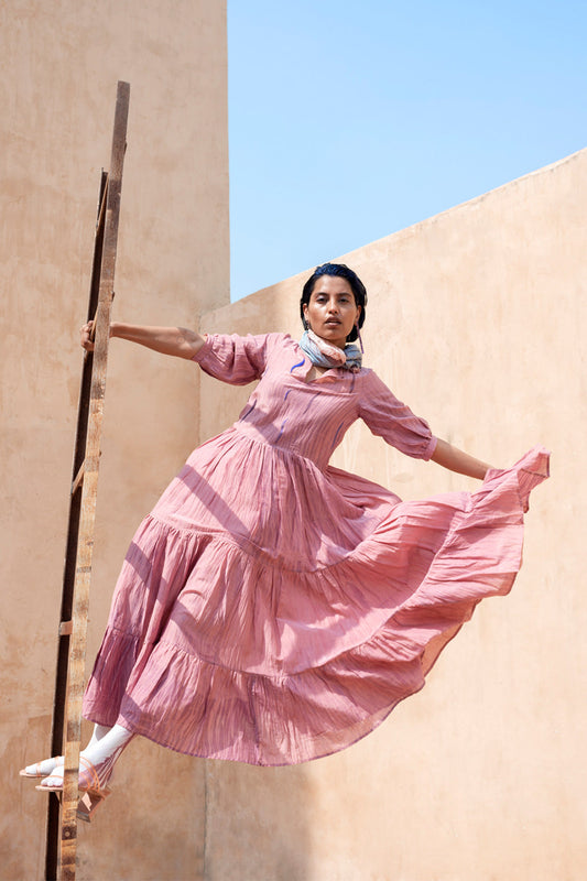 Pink Embroidered Tiered Dress at Kamakhyaa by The Loom Art. This item is Best Selling, Between the Lines, FB ADS JUNE, Handwoven cotton silk, July Sale, July Sale 2023, Maxi Dresses, Natural, Party Wear, Pink, Regular Fit, Solids, Tiered Dresses, Womenswear