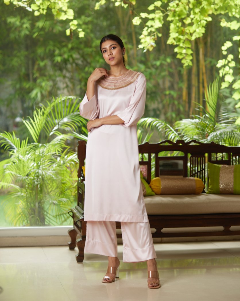 Pink Satin Silk Kurta Pant Set at Kamakhyaa by Mayura Kumar. This item is Casual Wear, Festive Wear, Kurta Pant Sets, Mayura Kumar, Pink, Regular Fit, Satin, Silk, Solids, Timeless Elegance, Womenswear