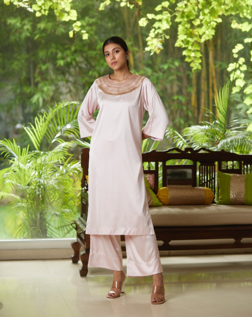 Pink Satin Silk Kurta Pant Set at Kamakhyaa by Mayura Kumar. This item is Casual Wear, Festive Wear, Kurta Pant Sets, Mayura Kumar, Pink, Regular Fit, Satin, Silk, Solids, Timeless Elegance, Womenswear