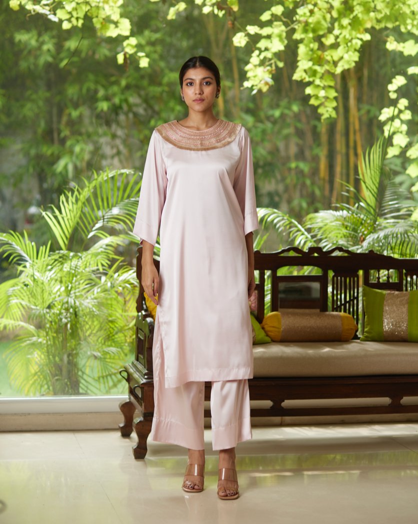 Pink Satin Silk Kurta Pant Set at Kamakhyaa by Mayura Kumar. This item is Casual Wear, Festive Wear, Kurta Pant Sets, Mayura Kumar, Pink, Regular Fit, Satin, Silk, Solids, Timeless Elegance, Womenswear