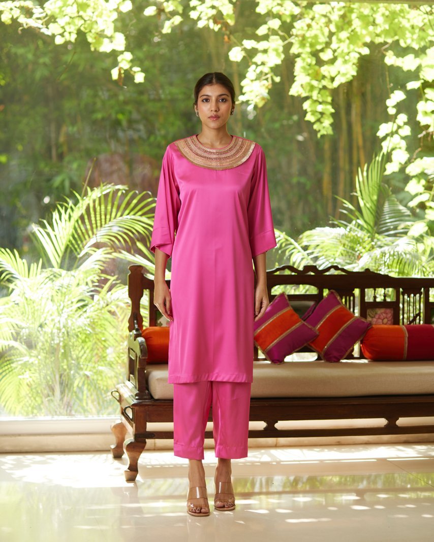 Pink Satin Silk Kurta Set at Kamakhyaa by Mayura Kumar. This item is Casual Wear, Festive Wear, Kurta Pant Sets, Mayura Kumar, Natural, Pink, Regular Fit, Satin, Silk, Solids, Timeless Elegance, Womenswear