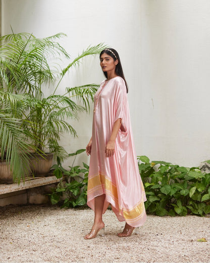 Pink Silk Kaftan With Golden Border at Kamakhyaa by Mayura Kumar. This item is Ajrakh Heritage, Casual Wear, Dresses, Festive Wear, Kaftans, Mayura Kumar, Modal Silk, Relaxed Fit, Solids, Womenswear