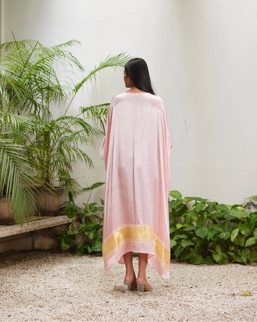 Pink Silk Kaftan With Golden Border at Kamakhyaa by Mayura Kumar. This item is Ajrakh Heritage, Casual Wear, Dresses, Festive Wear, Kaftans, Mayura Kumar, Modal Silk, Relaxed Fit, Solids, Womenswear
