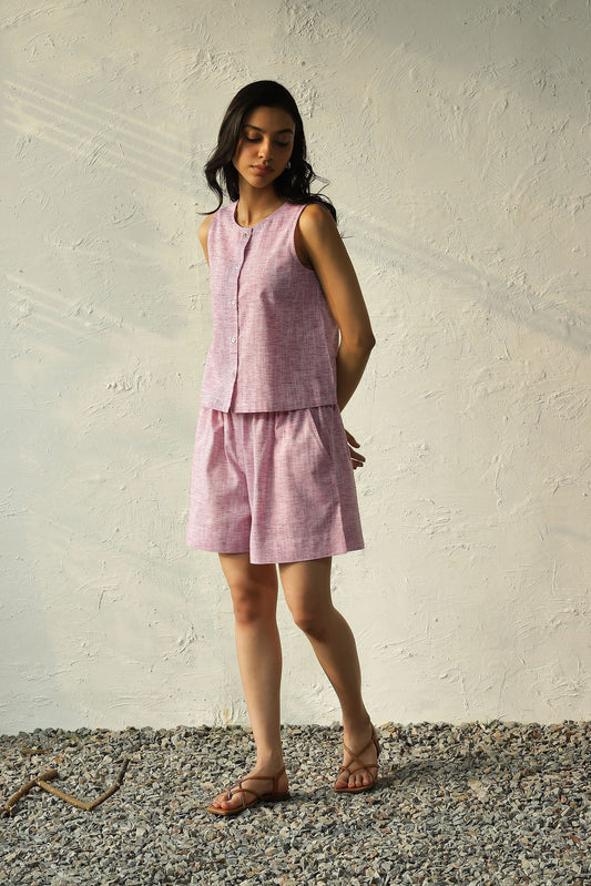 Pink Sleeveless Buttoned Top With Shorts Co-Ord Set at Kamakhyaa by Canoopi. This item is Canoopi, Casual Wear, Complete Sets, Khadi, Natural, Pink, Regular Fit, Solids, Vacation Co-ords, Womenswear