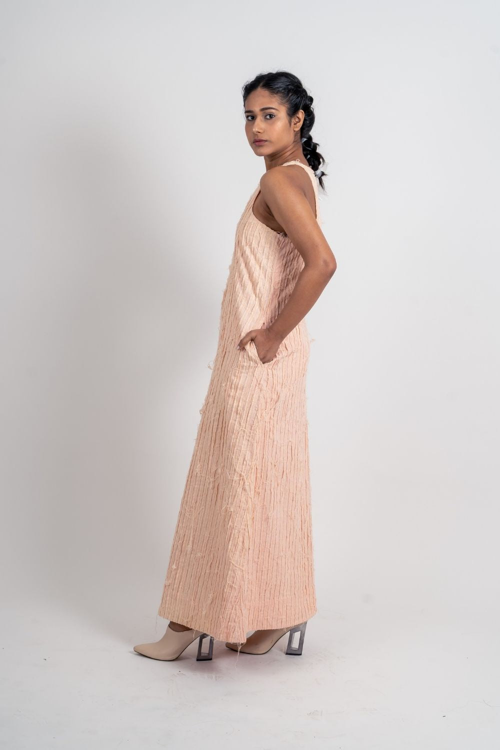 Pink Textured Halter Dress at Kamakhyaa by Ahmev. This item is Casual Wear, FB ADS JUNE, Halter Neck Dresses, Handloom Cotton, July Sale, July Sale 2023, Maxi Dresses, Natural, Pink, Relaxed Fit, Textured, Womenswear