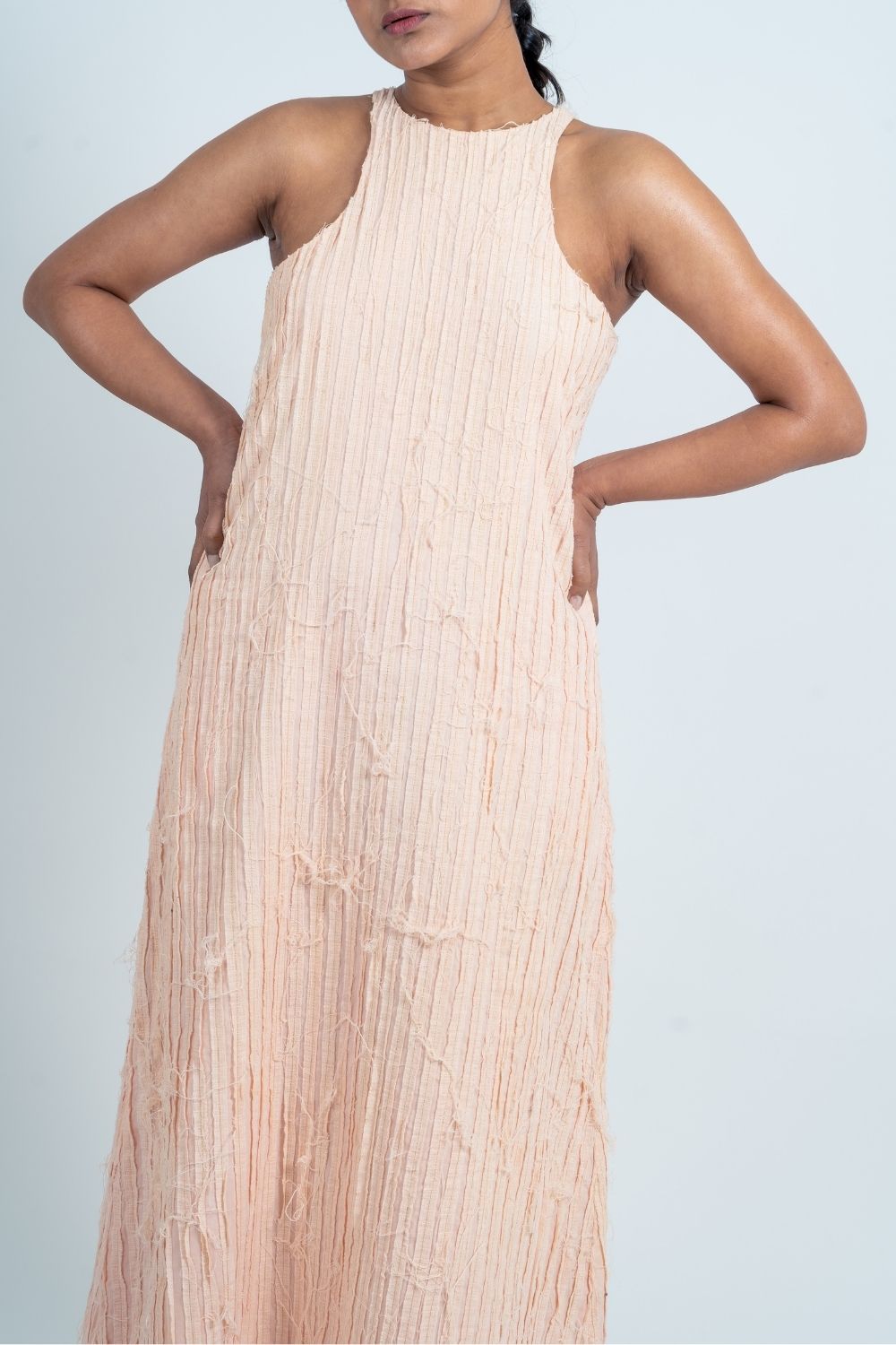 Pink Textured Halter Dress at Kamakhyaa by Ahmev. This item is Casual Wear, FB ADS JUNE, Halter Neck Dresses, Handloom Cotton, July Sale, July Sale 2023, Maxi Dresses, Natural, Pink, Relaxed Fit, Textured, Womenswear