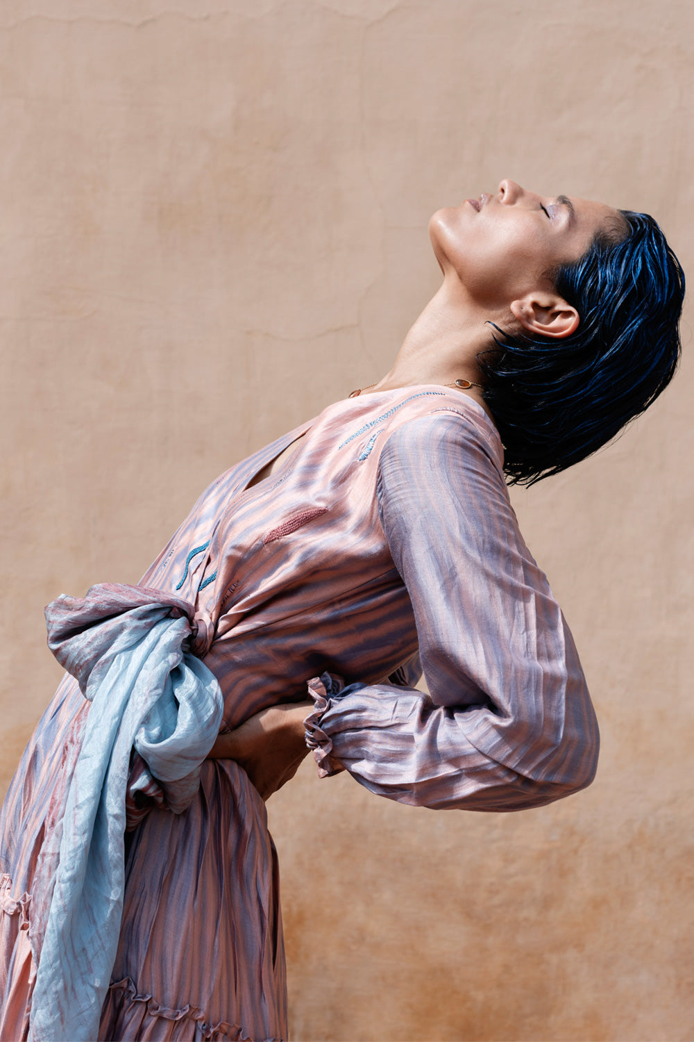 Pink Textured Tier Dress at Kamakhyaa by The Loom Art. This item is Between the Lines, Fall, July Sale, July Sale 2023, Maxi Dresses, Natural, Ombre & Dyes, Party Wear, Pink, Regular Fit, Tiered Dresses, Womenswear, Wrap Dresses