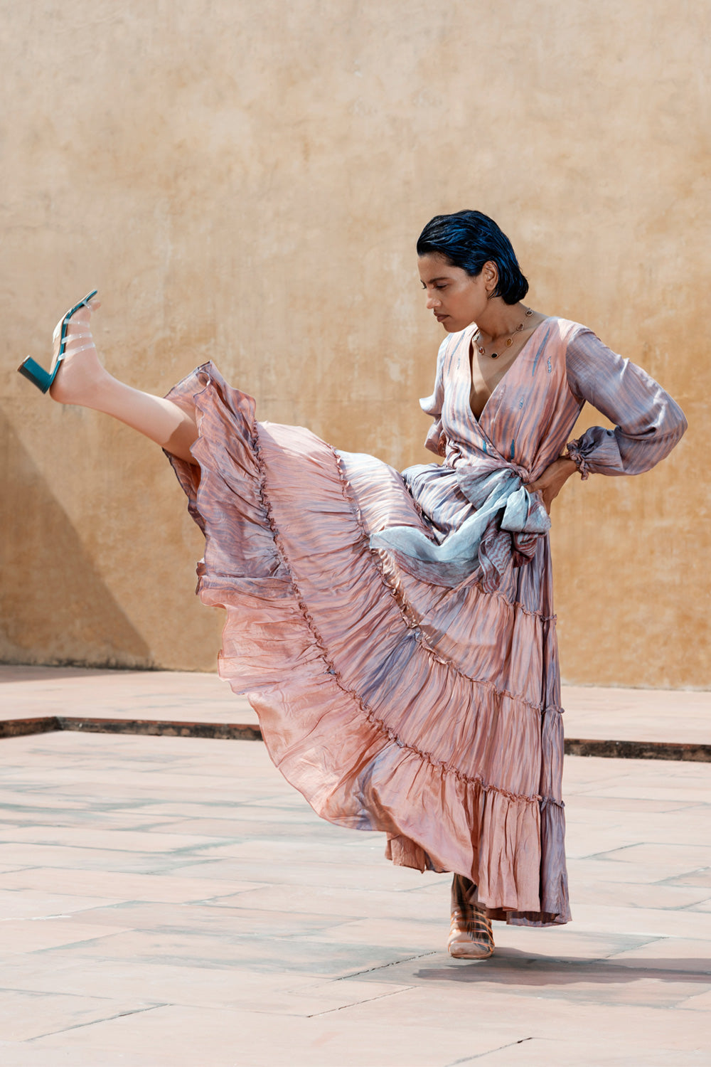 Pink Textured Tier Dress at Kamakhyaa by The Loom Art. This item is Between the Lines, Fall, July Sale, July Sale 2023, Maxi Dresses, Natural, Ombre & Dyes, Party Wear, Pink, Regular Fit, Tiered Dresses, Womenswear, Wrap Dresses