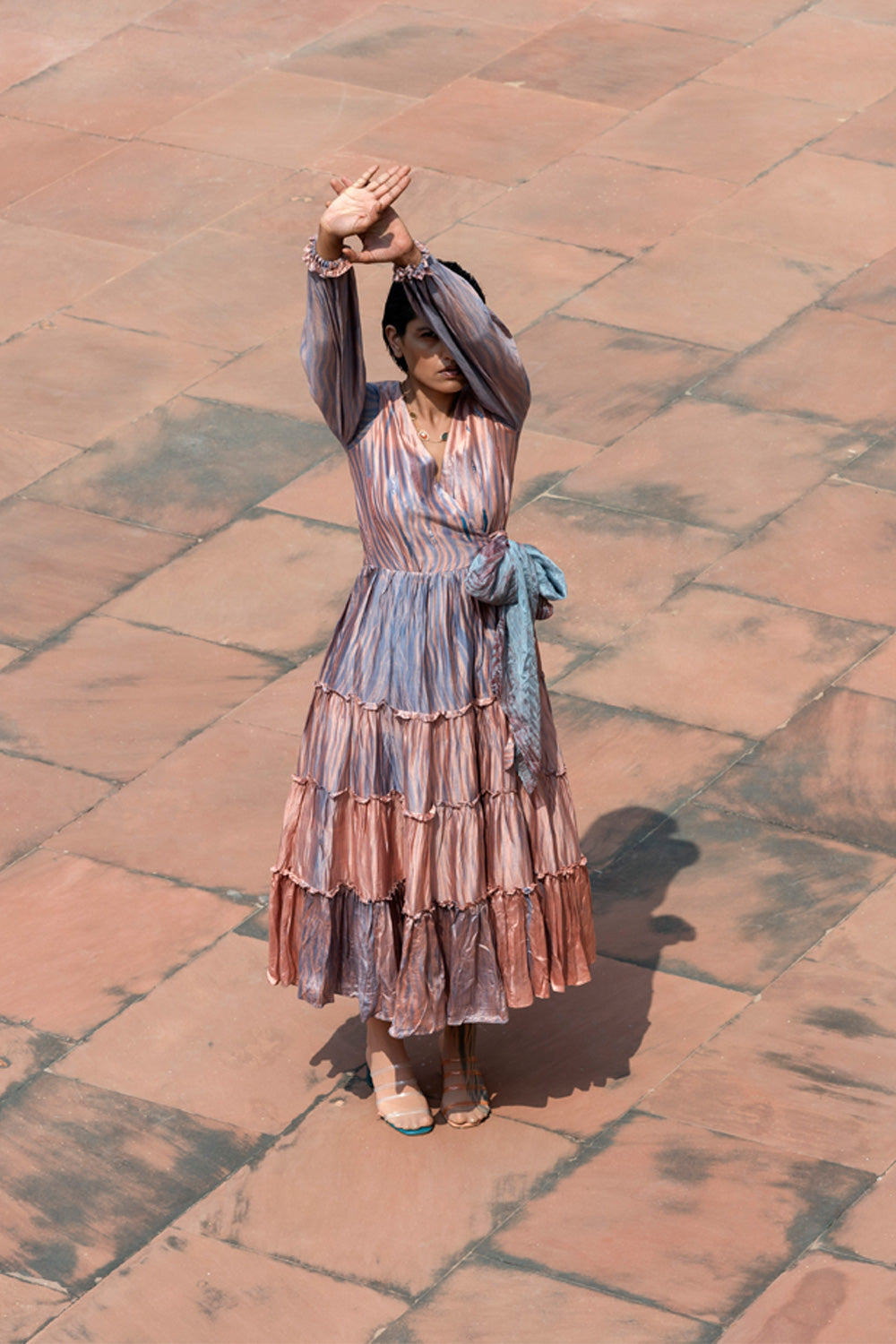 Pink Textured Tier Dress at Kamakhyaa by The Loom Art. This item is Between the Lines, Fall, July Sale, July Sale 2023, Maxi Dresses, Natural, Ombre & Dyes, Party Wear, Pink, Regular Fit, Tiered Dresses, Womenswear, Wrap Dresses