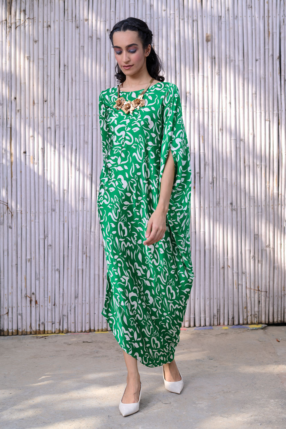 Printed Asymmetric Drape Dress at Kamakhyaa by Kanelle. This item is Dresses, Festive Wear, Green, Midi Dresses, Natural, Partywear Co-ords, Printed, Rang, Regular Fit, Viscose Satin, Womenswear
