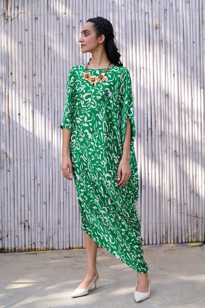 Printed Asymmetric Drape Dress at Kamakhyaa by Kanelle. This item is Dresses, Festive Wear, Green, Midi Dresses, Natural, Partywear Co-ords, Printed, Rang, Regular Fit, Viscose Satin, Womenswear