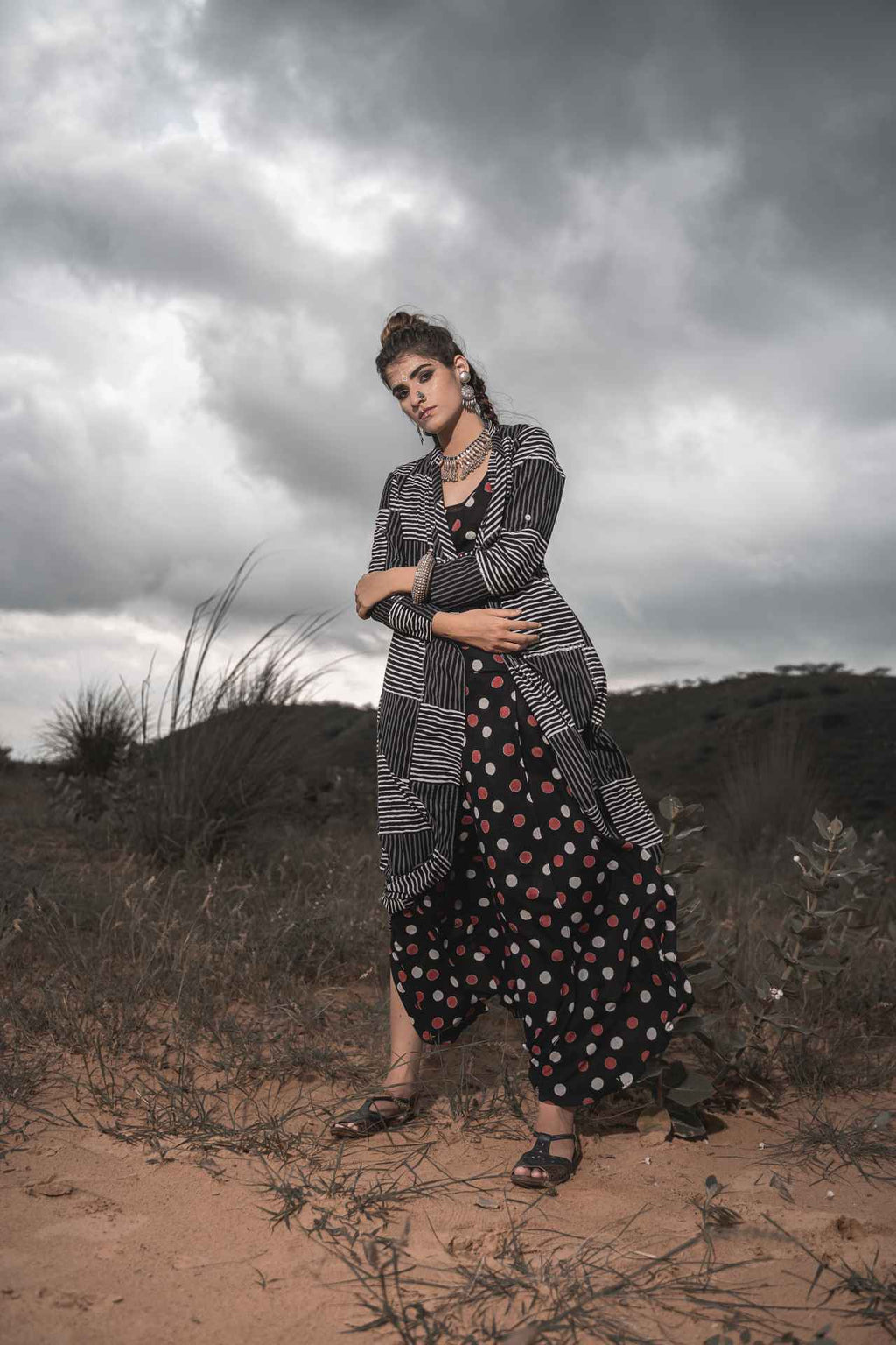 Printed Cotton Top With Asymmetric Cape And Palazzo - Set Of 3 at Kamakhyaa by Keva. This item is Black, Block Prints, Cape, Co-ord Sets, Cotton, Natural, Relaxed Fit, Resort Wear, Vacation, Vacation Co-ords, Wild Child, Womenswear