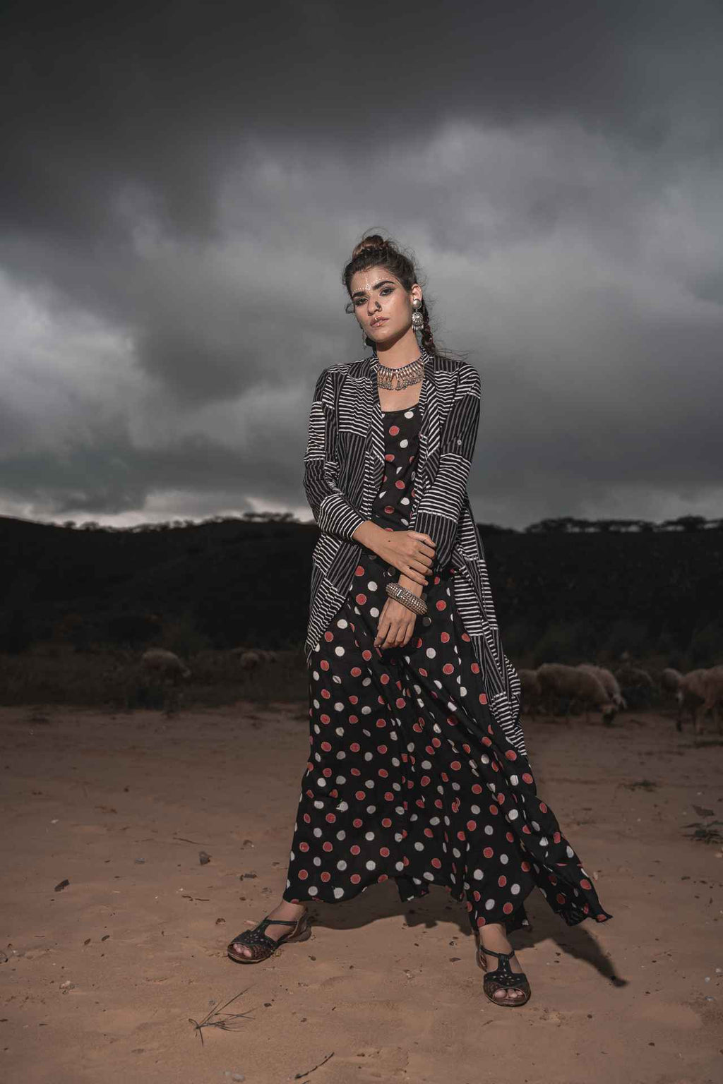 Printed Cotton Top With Asymmetric Cape And Palazzo - Set Of 3 at Kamakhyaa by Keva. This item is Black, Block Prints, Cape, Co-ord Sets, Cotton, Natural, Relaxed Fit, Resort Wear, Vacation, Vacation Co-ords, Wild Child, Womenswear