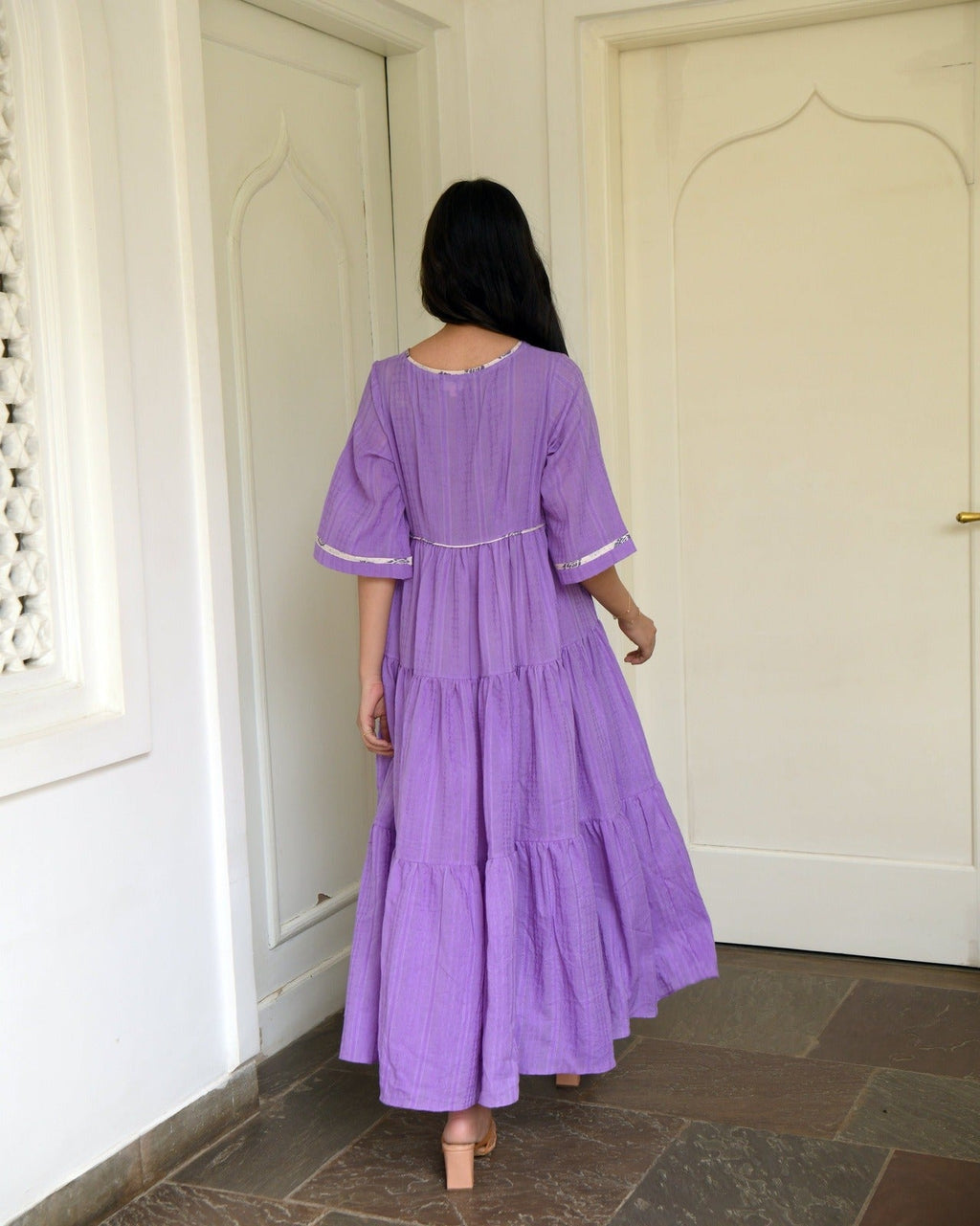 Purple Tiered Maxi Dress at Kamakhyaa by Taro. This item is Best Selling, Evening Wear, FB ADS JUNE, Handwoven cotton, July Sale, July Sale 2023, Natural, Purple, Regular Fit, Solids, Tiered Dresses, Wildflower Taro, Womenswear